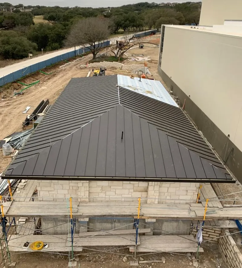 Metal roof new construction with scaffolding in Vineyard